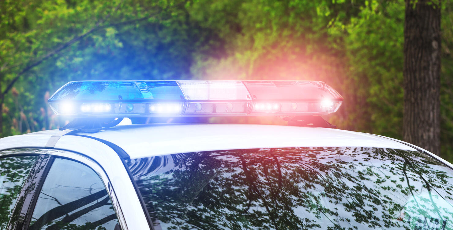 Police sirens in operation. Blue and red flash lights of emergency car in action. Police crew with the siren lights on emergency alert.