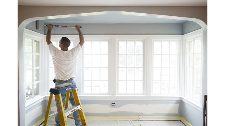 Contractor Painting a Room in HOuse