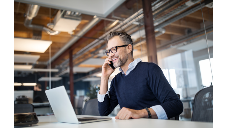 Businessman working in a new office