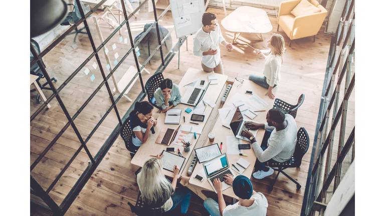 Young people work in modern office.