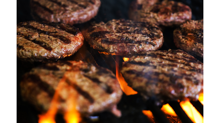 Hamburgers on barbeque grill