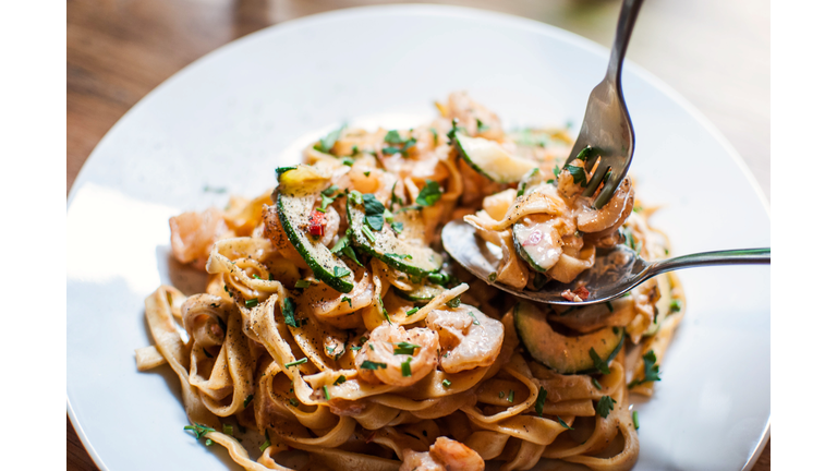 Close-Up Of Tagliatelle Pasta Served In Plate On Table