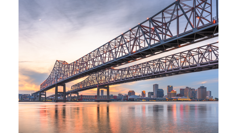 New Orleans, Louisiana, USA at Crescent City Connection Bridge over the Mississippi River.