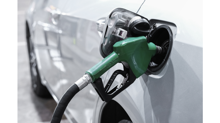 Cropped of machine Refueling Car