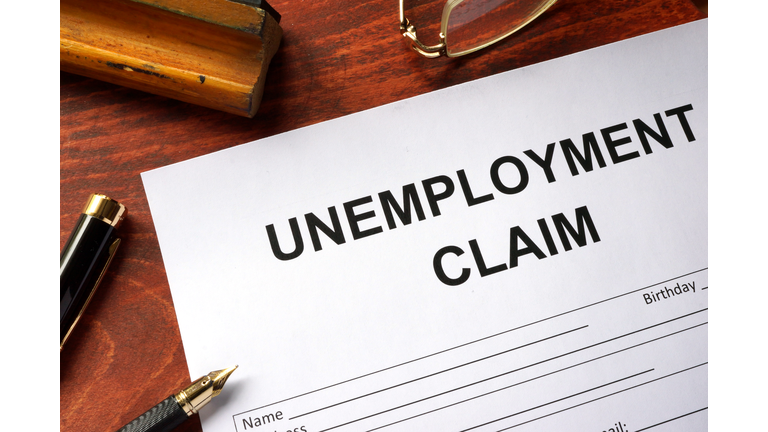 Unemployment claim form on an office table.