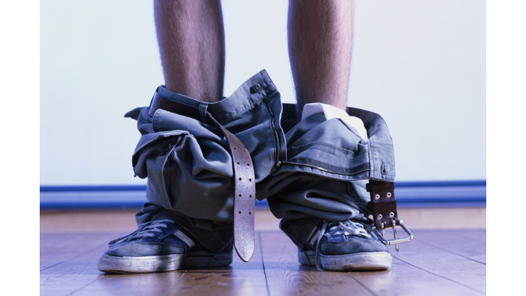 LEGS WITH PANTS AROUND ANKLES