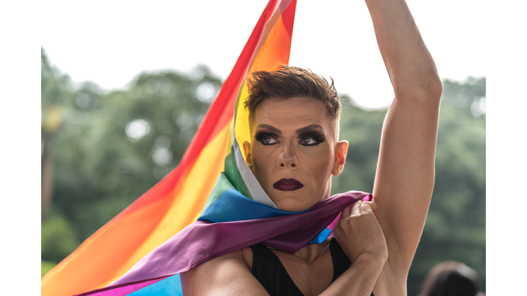Gay Boy Holding Rainbow Flag