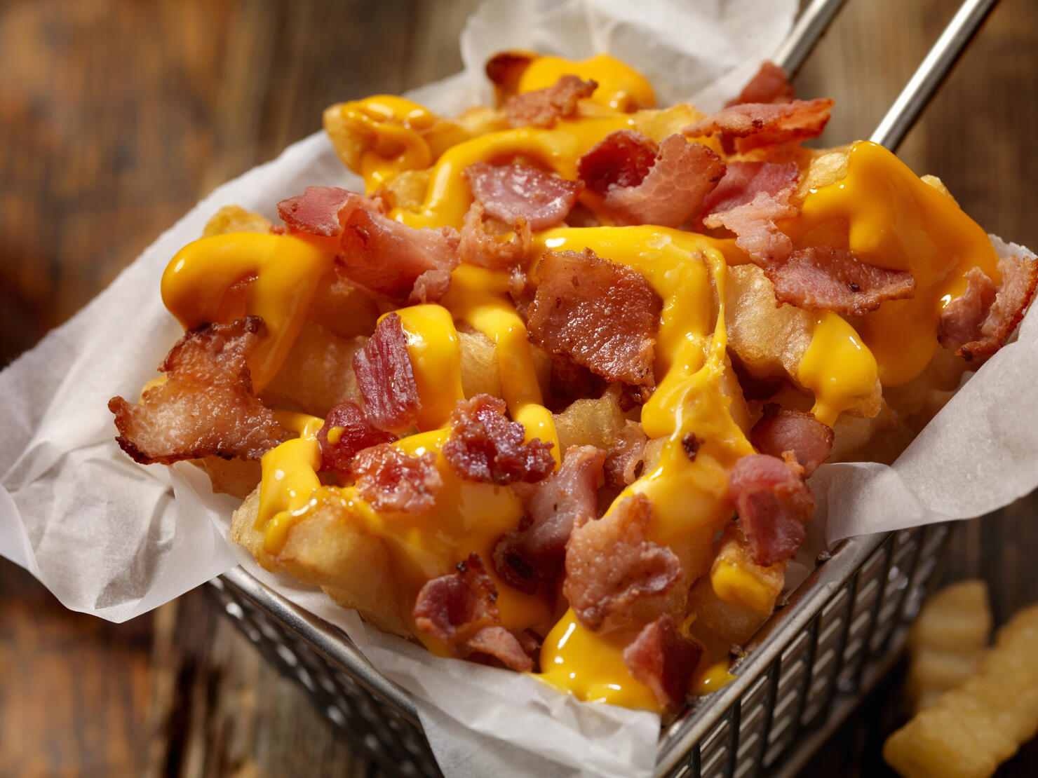 Basket of Bacon Cheesy Crinkle Cut French Fries