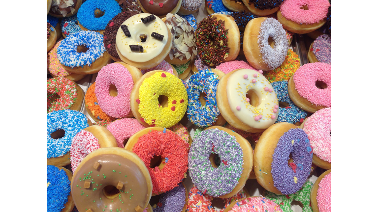 High Angle View Of Colorful Donuts For Sale In Store