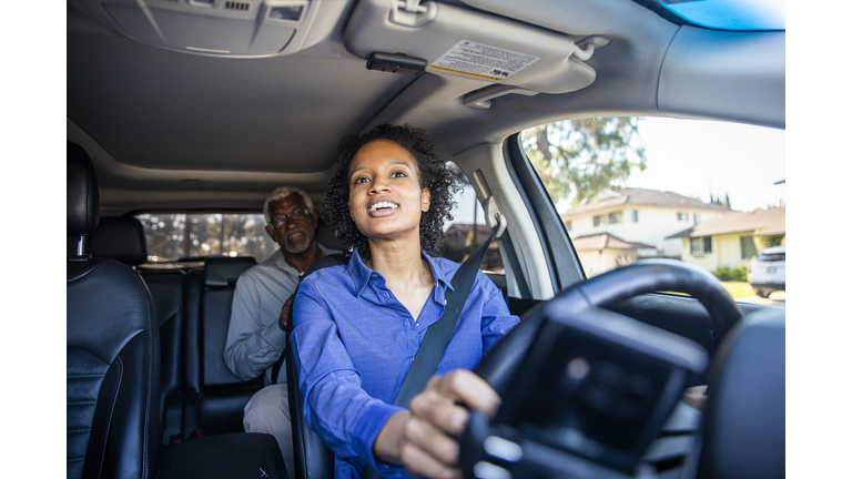 Young Black Woman Driving Car for Rideshare