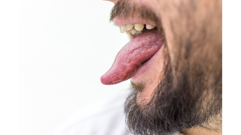 Man with tongue out