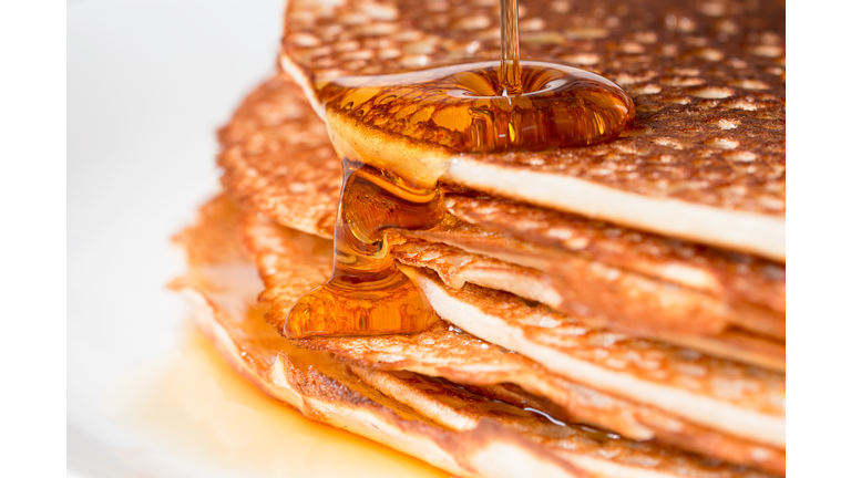 Stack of pancakes with maple syrup