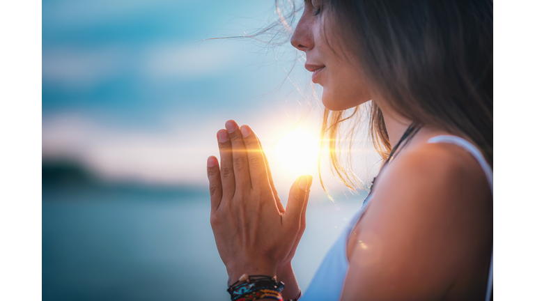 Meditating. Close Up Female Hands Prayer
