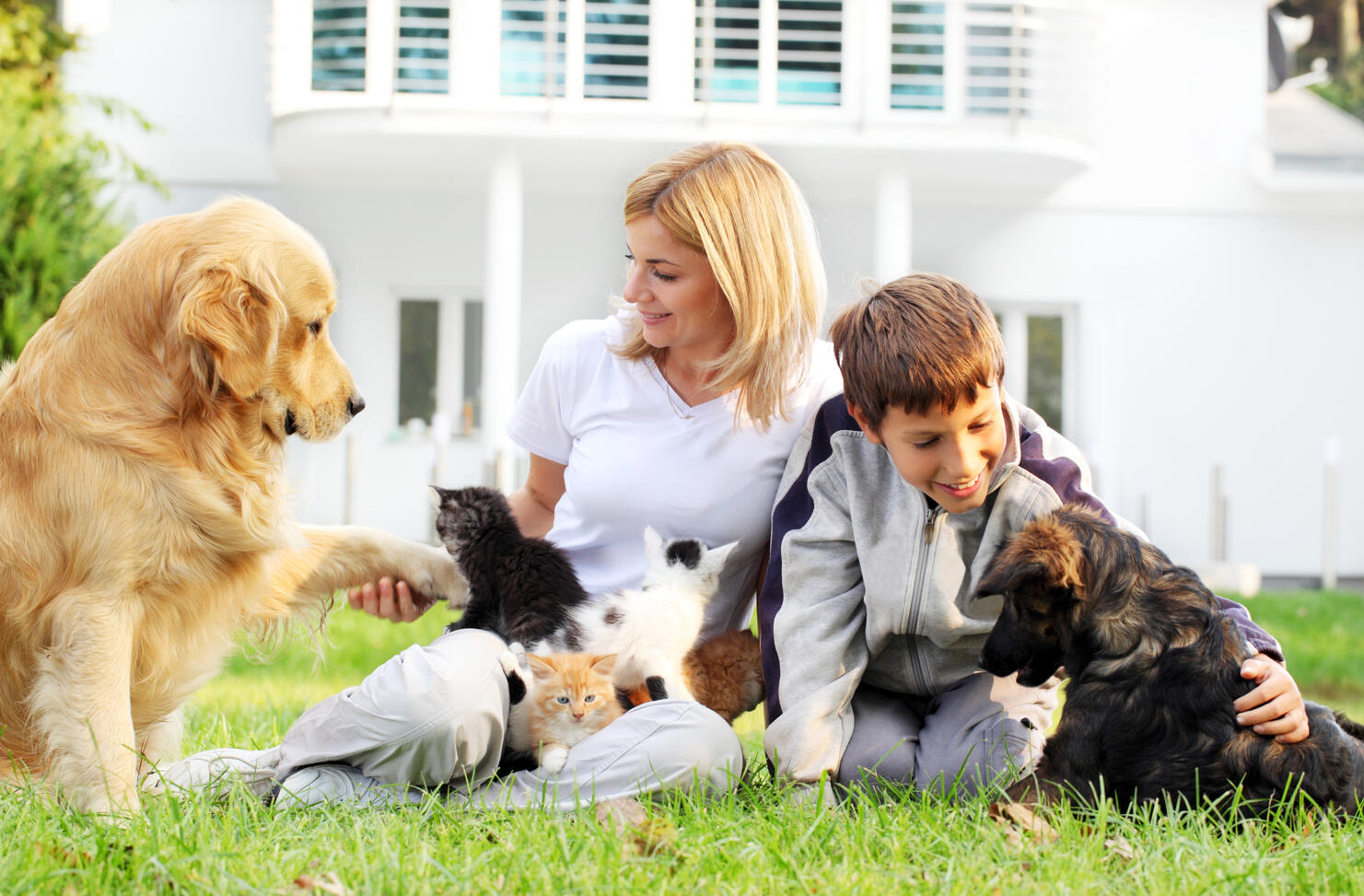 Mother, son and pets.
