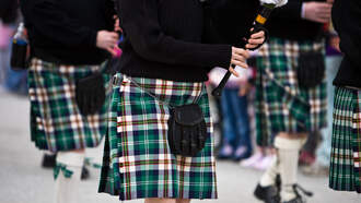 Paul and Al - Record-Breaking Number of Bagpipers Unite to Welcome AC/DC Home