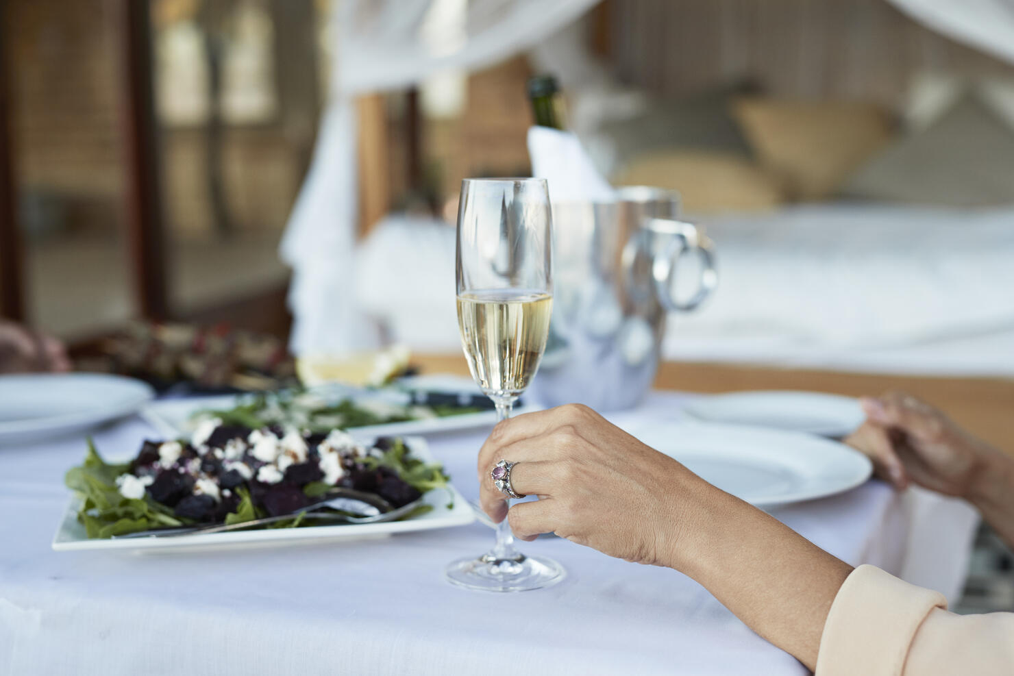 Couple having private romantic dinner in luxury cabin