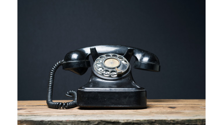 Close-Up Of Telephone On Table