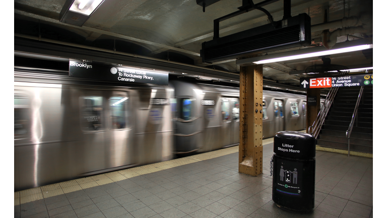 Subway car speeding in New York City subway station