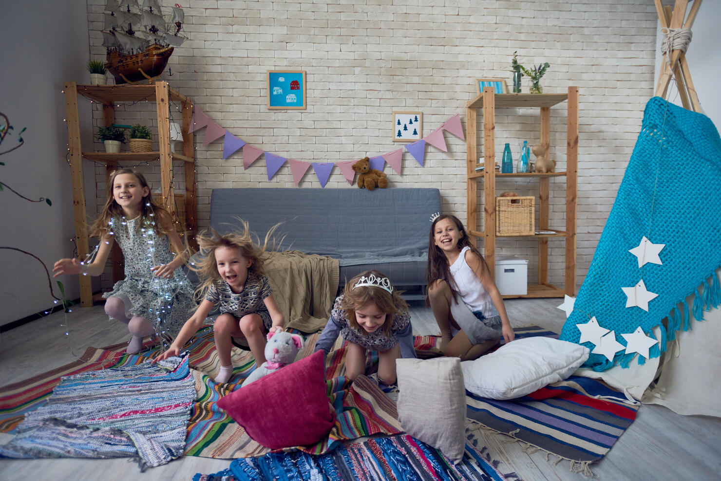 Expressive kids having fun in playroom