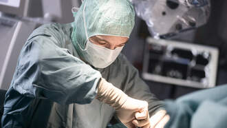 GOOD NEWS! Brain Surgeon "Fixes" TV News Cameraman's Tremors