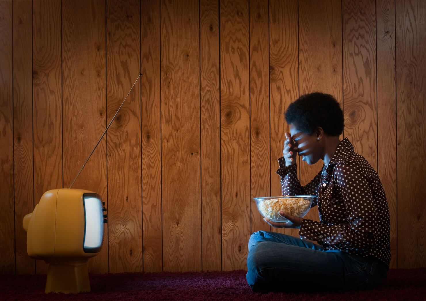 Woman watching scary movie