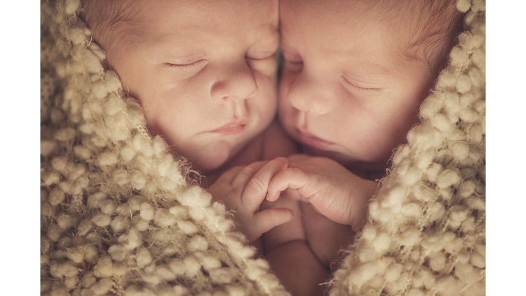 Baby small twins and newborn and heart