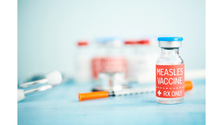 Stethoscope and Syringe with Measles Vaccine