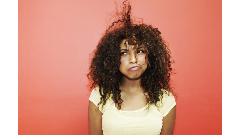 Young Woman Having Bad Hair Day