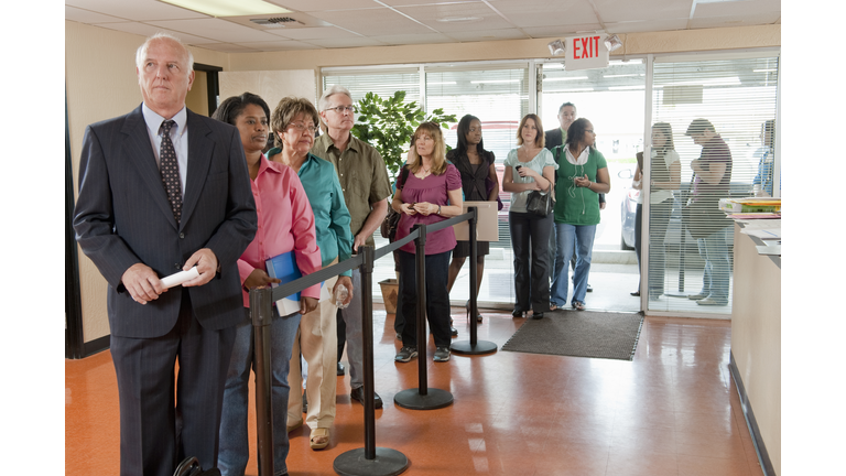 Long Line of People at Unemployment Office