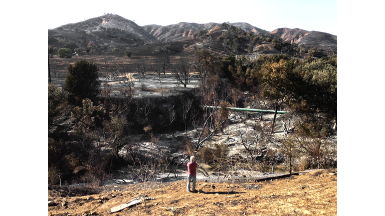 Man Overlooks the Woolsey Wild Fire Aftermath Southern California, November, 2018