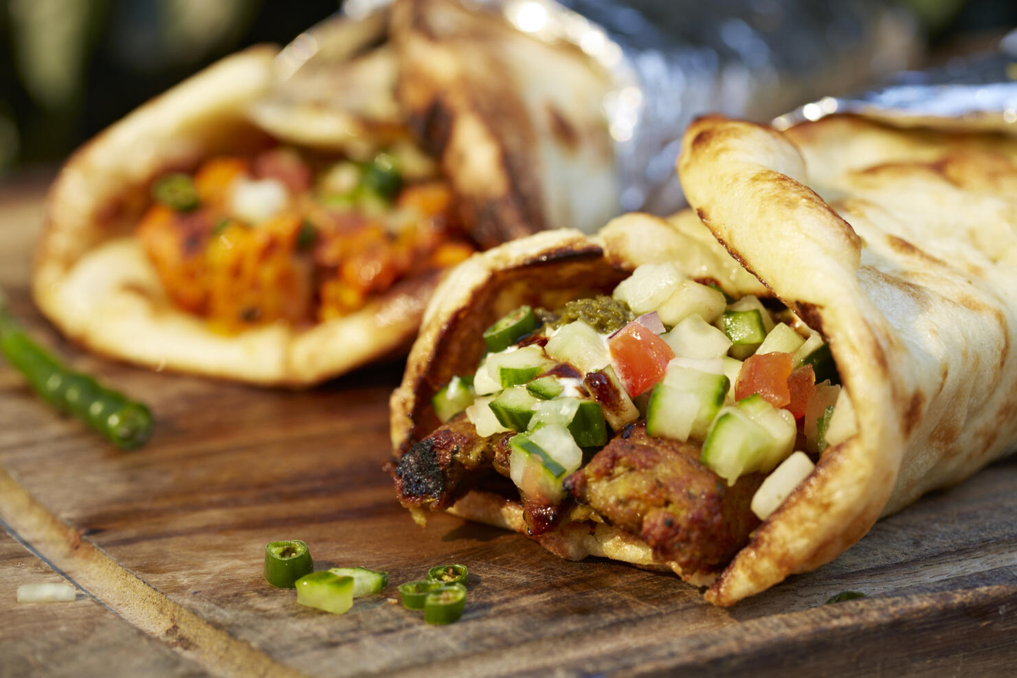Indian Tandoori chicken wrap and lamb kebab on food truck
