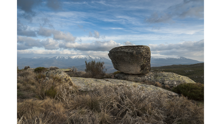 Large boulder on top of hill
