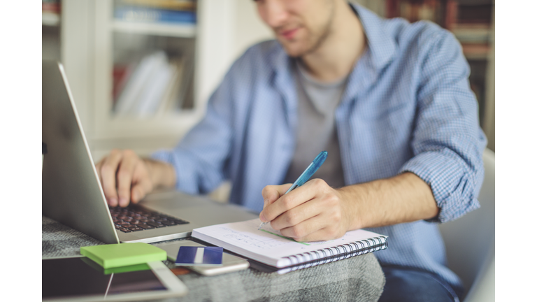 Young man working at home