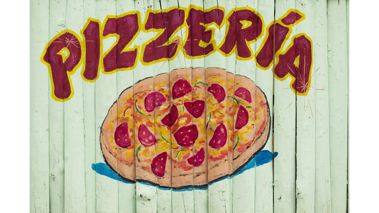 sign for Cuban pizzeria