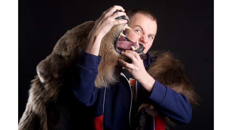 Man wrestles with bear