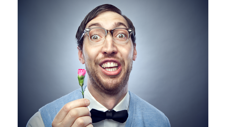 Nerd Student Giving Flower