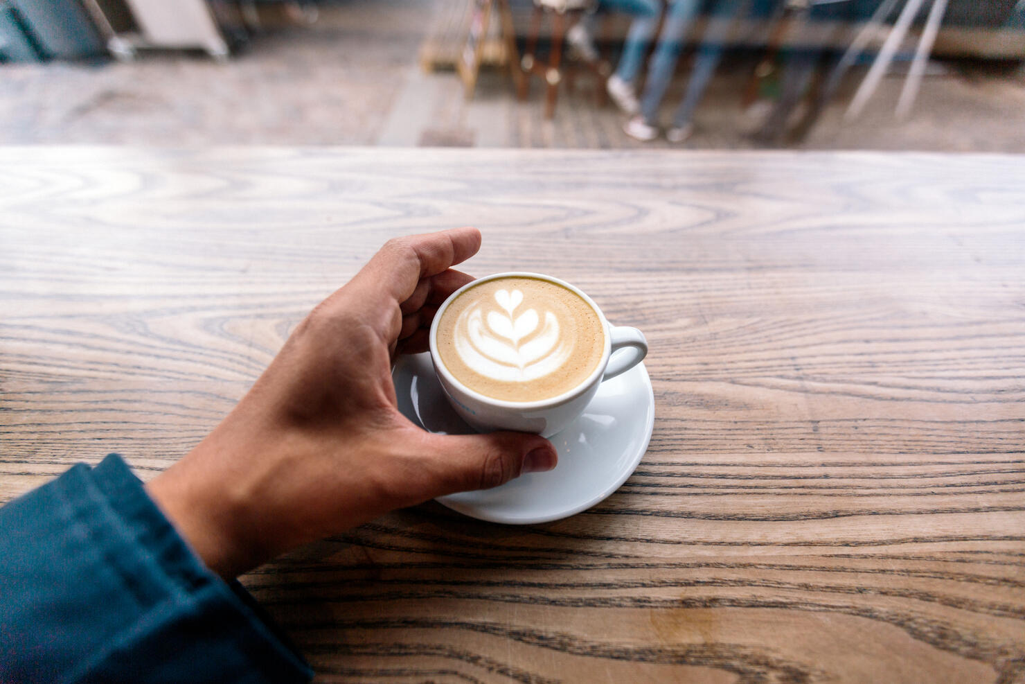 Drinking cappuccino, first person view