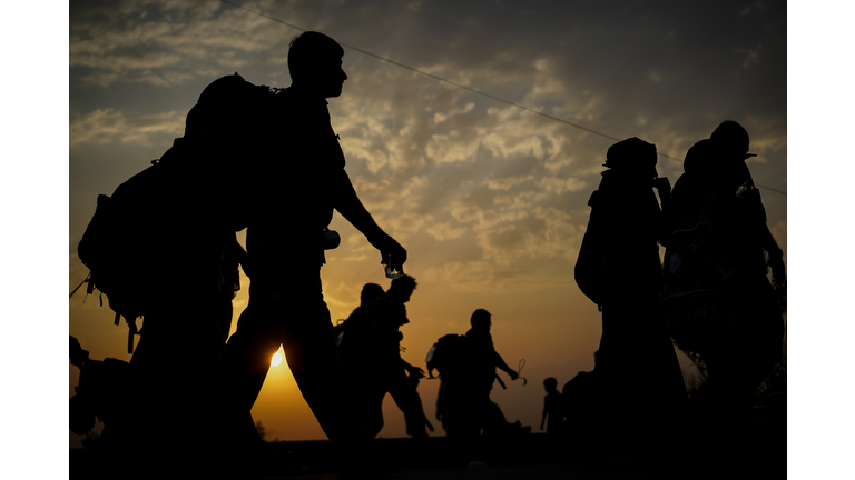 Immigrants walking for hope in better future