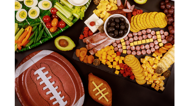 Delicious charcuterie board and veggie with dipping for Super Bowl game.