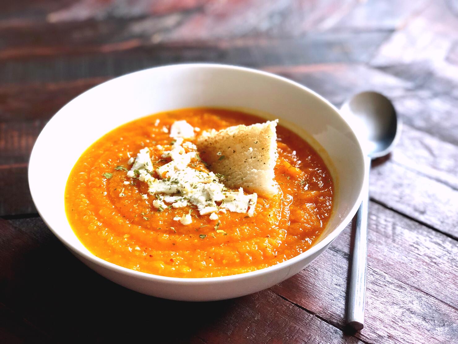 High Angle View Of Soup In Bowl On Wooden Table