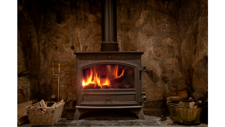 Cozy Fireplace With A Wood Burning Stove