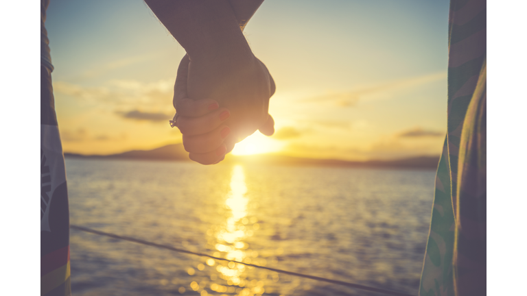 Couple of lovers holding hands