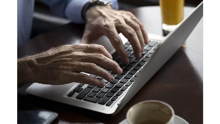 Man using laptop computer