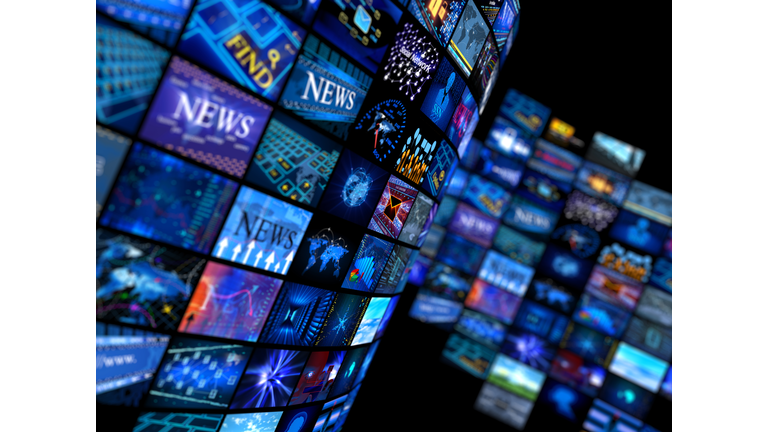 Multiple television screens in blue tones