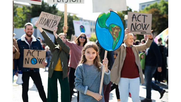 People with placards and posters on global strike for climate change.