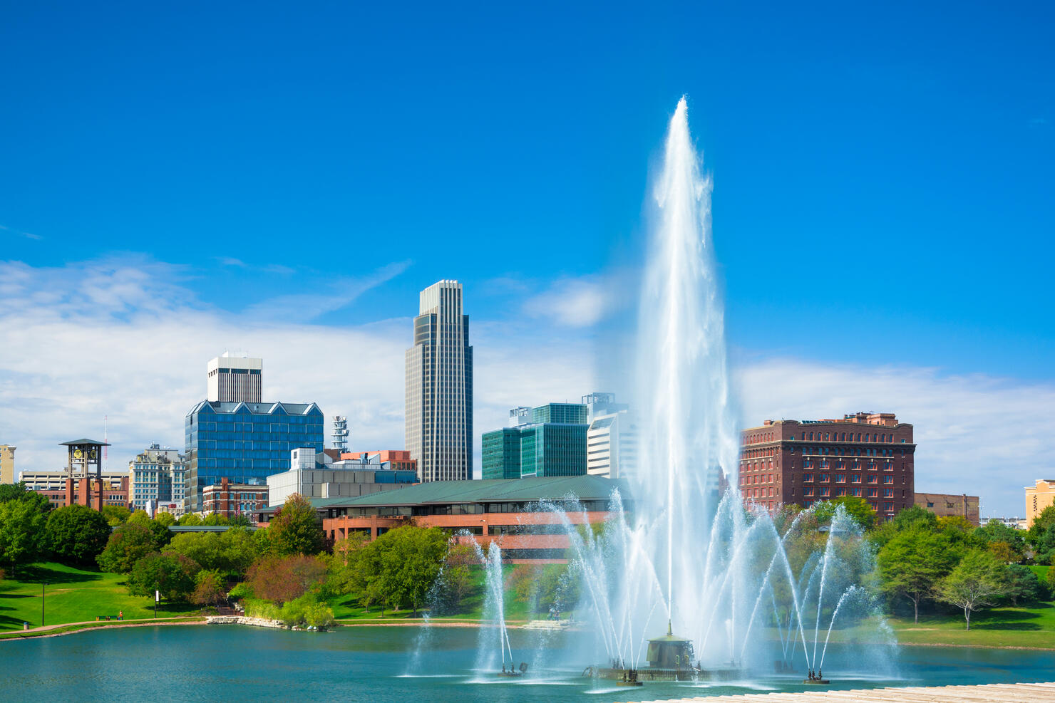 Omaha skyline with fountain and lake