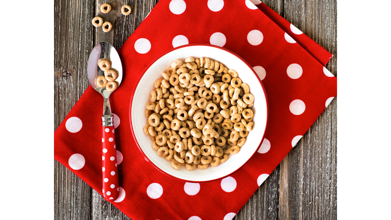 Bowl of breakfast cereal and polka dot napkin