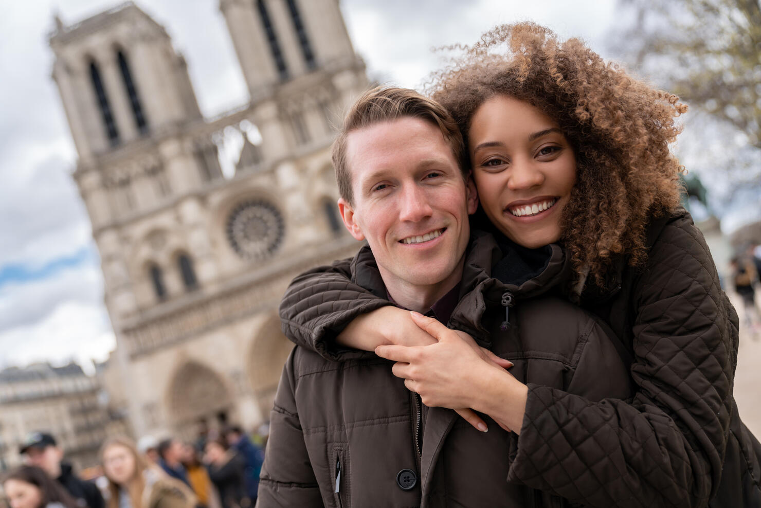 Portrait of a happy couple sightseeing in Paris