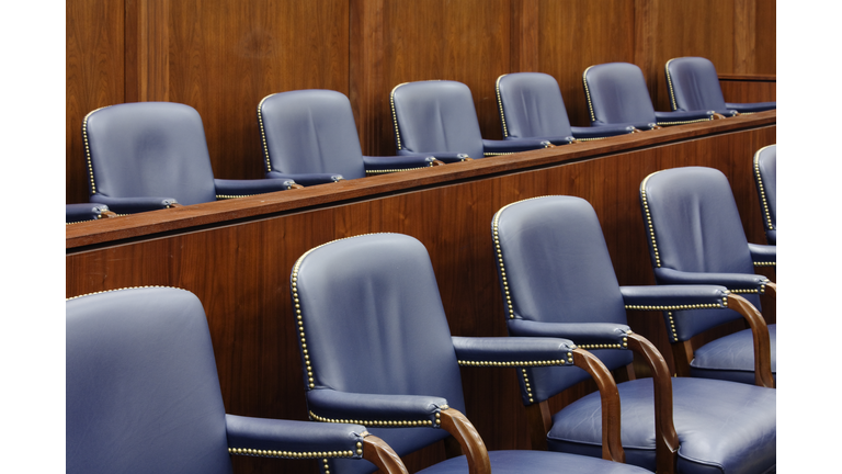 Empty Jury Seats in Courtroom