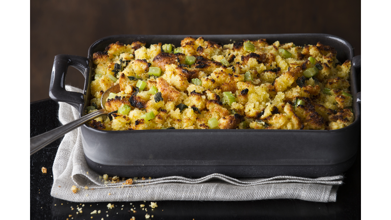 Spoon in tray of stuffing